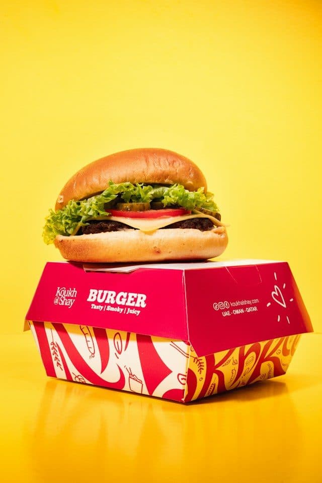 Burger sitting on a custom printed burger box