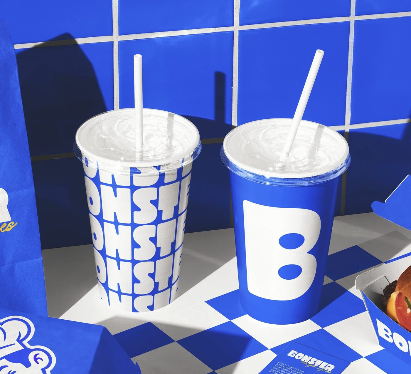 Branded cups and packaging at a burger shop